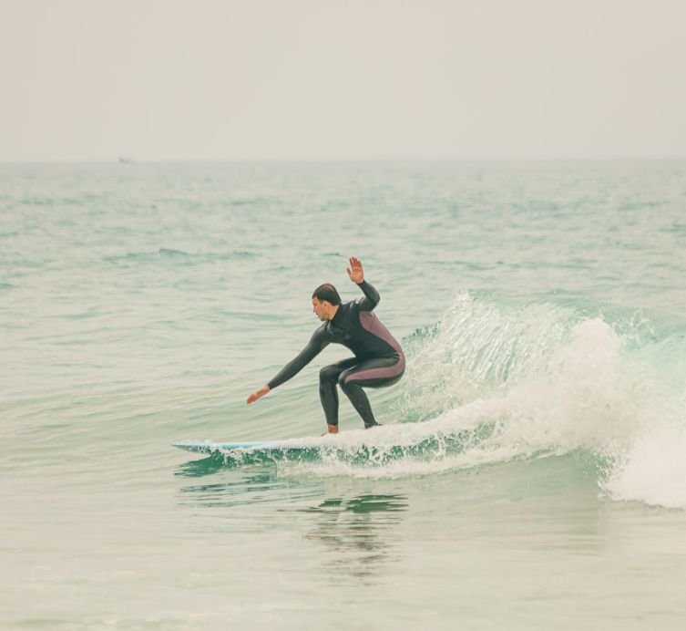 surfer learning to surf at taghazout