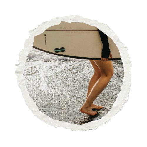 surfer in taghazout holding a surfboard